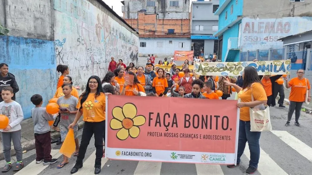 Caminhada do Maio Laranja mobiliza comunidade em defesa da infância no Jardim Conceição e Primeiro de Maio
